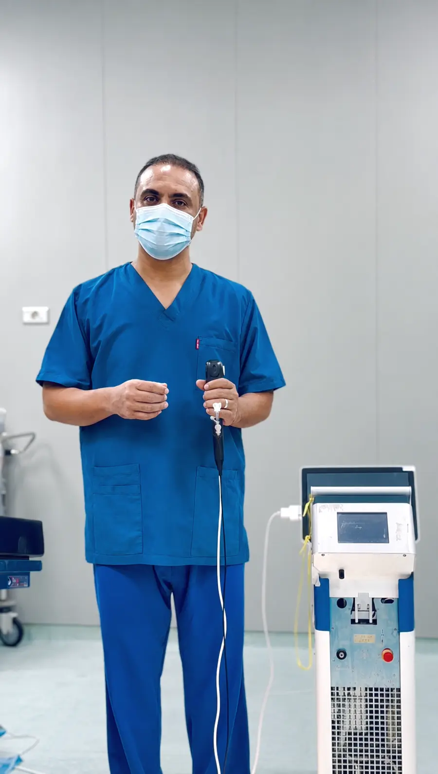 Consultant urologist with an endoscopy system in Libya