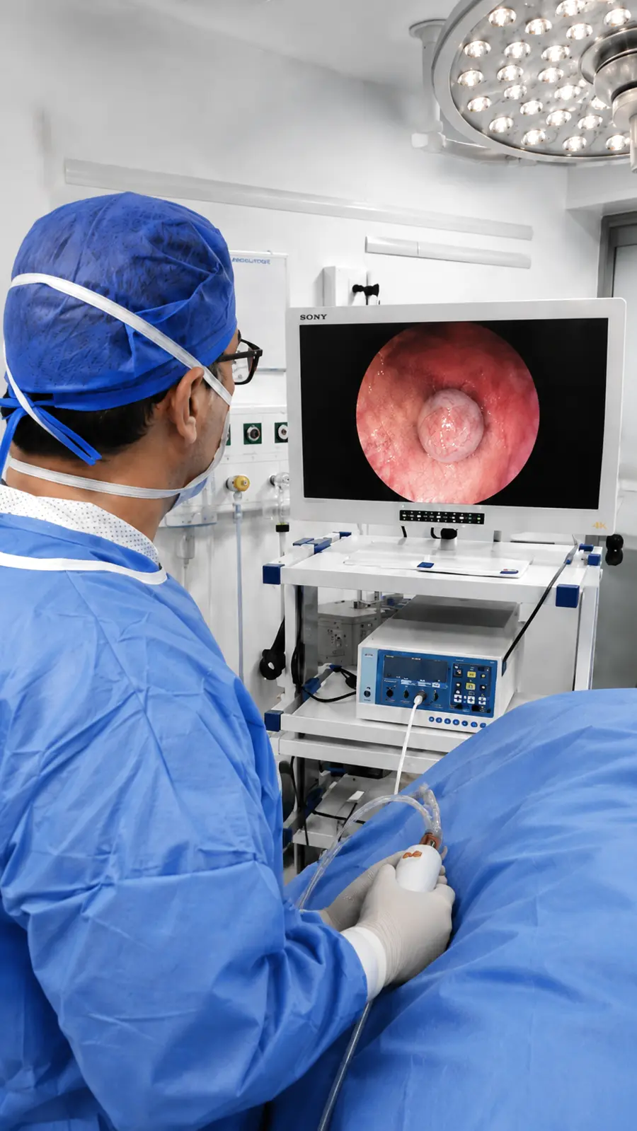 Clinician using a hysteroscopy system in the United Kingdom